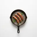 Berner Würstchen gebraten ohne Fett (Pfanne)