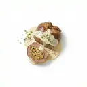 Kalbsherz gefüllt, gedünstet, mit Sahnesauce von dunkler/brauner Grundsauce