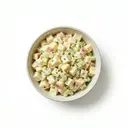 Selleriesalat (gegart) mit Apfel, Mayonnaise und Sahne